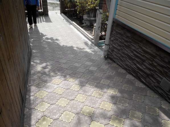 Укладка тротуарной плитки, бетонные работы в фото 4