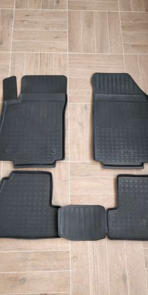 Комплект полиуретановых ковриков в салон и багажник Opel Mok