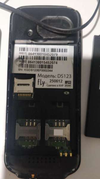 Мобильный телефон Fly DS123 (черно-серый) в фото 3