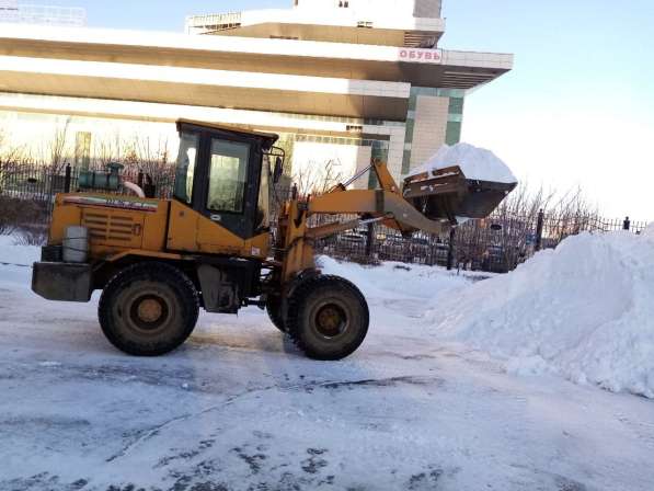Аренда трактора погрузчика. Уборка чистка и вывоз снега в Екатеринбурге фото 15