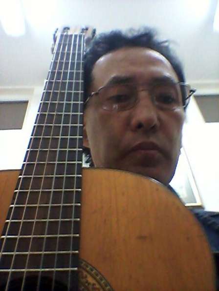 Обучение игре на акустической гитаре
